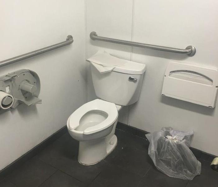 A bathroom in a local Walgreens was destroyed and left a mess!  